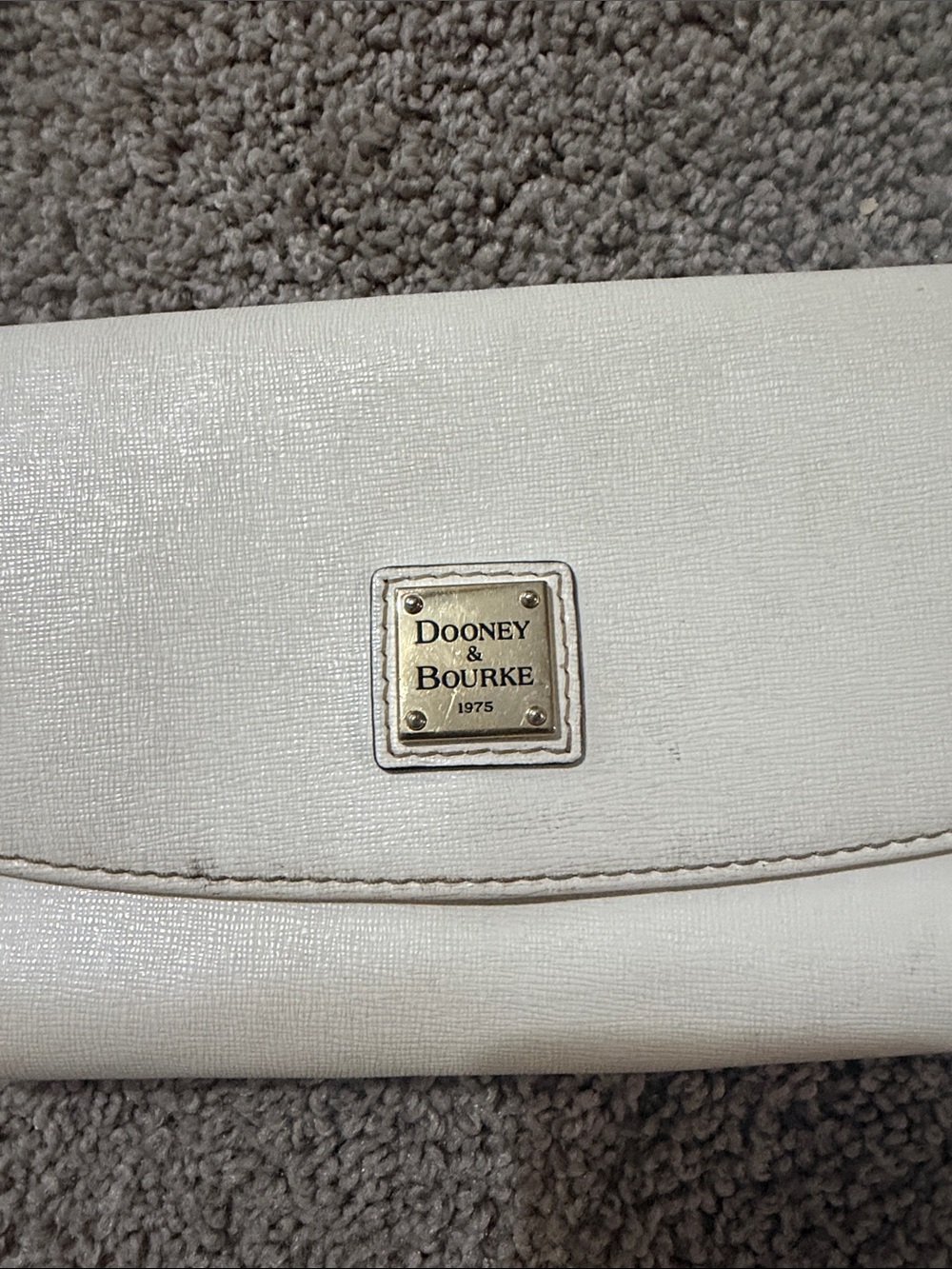 Dooney & Bourke Cream Leather Clutch with Gold Plaque